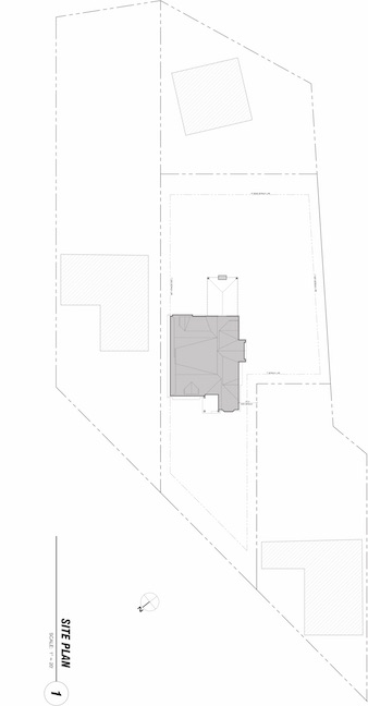 Site plan of home on angled street between two neighboring houses