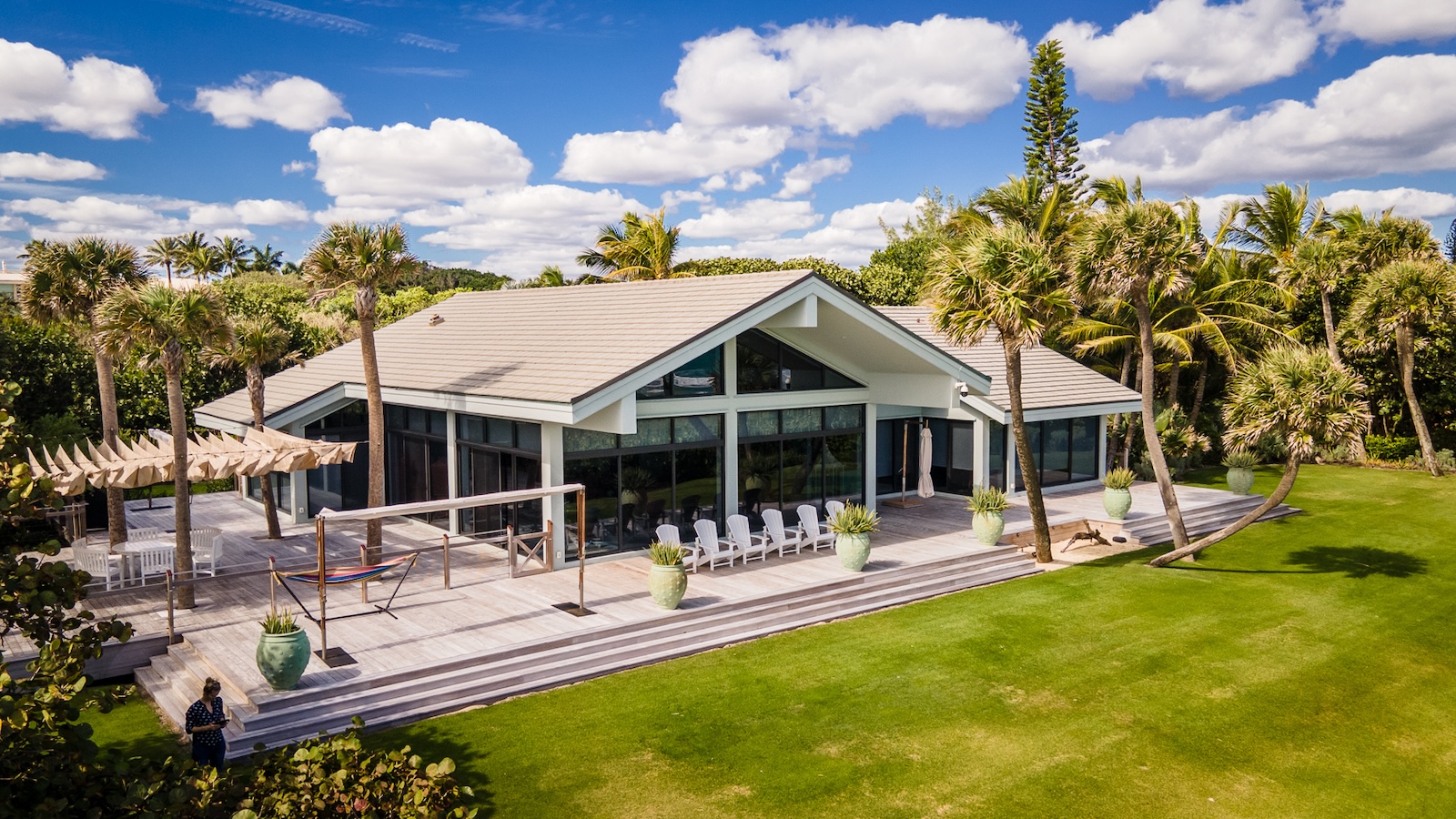 The deck on this Jupiter Island, Fla. home features rot-resistant materials and totals 5,000 square feet. | Photo: Jana Bannan