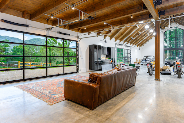 Exposed beams and lounge area in Hobby Barn garage